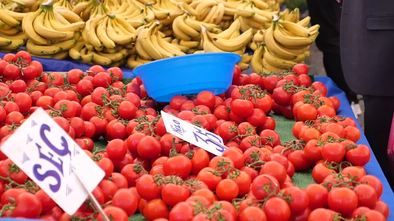 Fresh Bananas and Tomatoes at a Market
