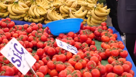 fresh bananas and tomatoes at a market