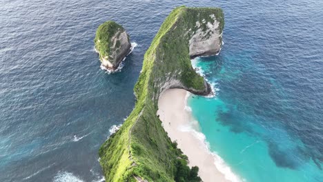 aerial footage of a stunning beachside - kelingking beach nusa penida