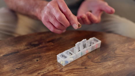 close-up of pill organizer with medication