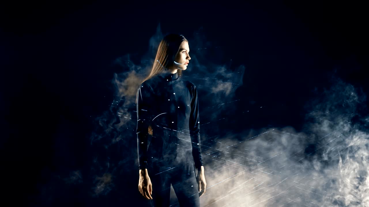Stylish fashion girl futuristic technology black background cinematic lighting with smoke and backlight effect.Prores