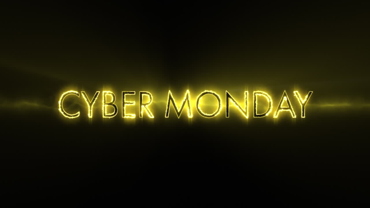 texto de cyber monday amarillo de neón que aparece contra una pantalla negra 4k