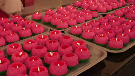 at thean hou temple, lotus seed candles create peaceful ambience, closeup