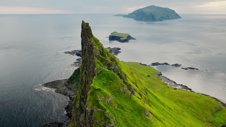 Dramatic Sea Stack and Green Cliffs of the Faroe Islands
