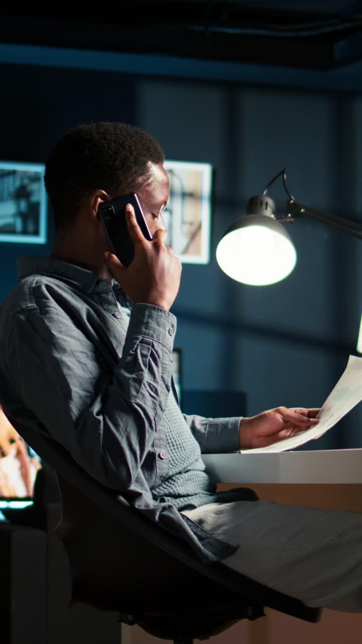 Man working in office at night