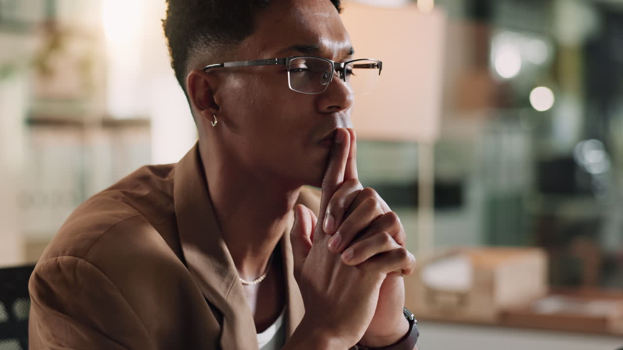 Thoughtful Young Man in Office
