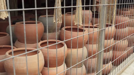 earthenware with large clay pots in marketplace of pomaire tourist town, santiago de chile