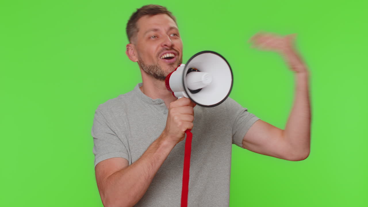Handsome man loudly scream in megaphone loudspeaker announces advertisement discounts sale Hurry up