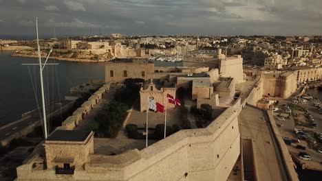 aerial view of fort st. angelo in the grand harbour of malta, europe. dolly shot reveailng the front side of the fort.