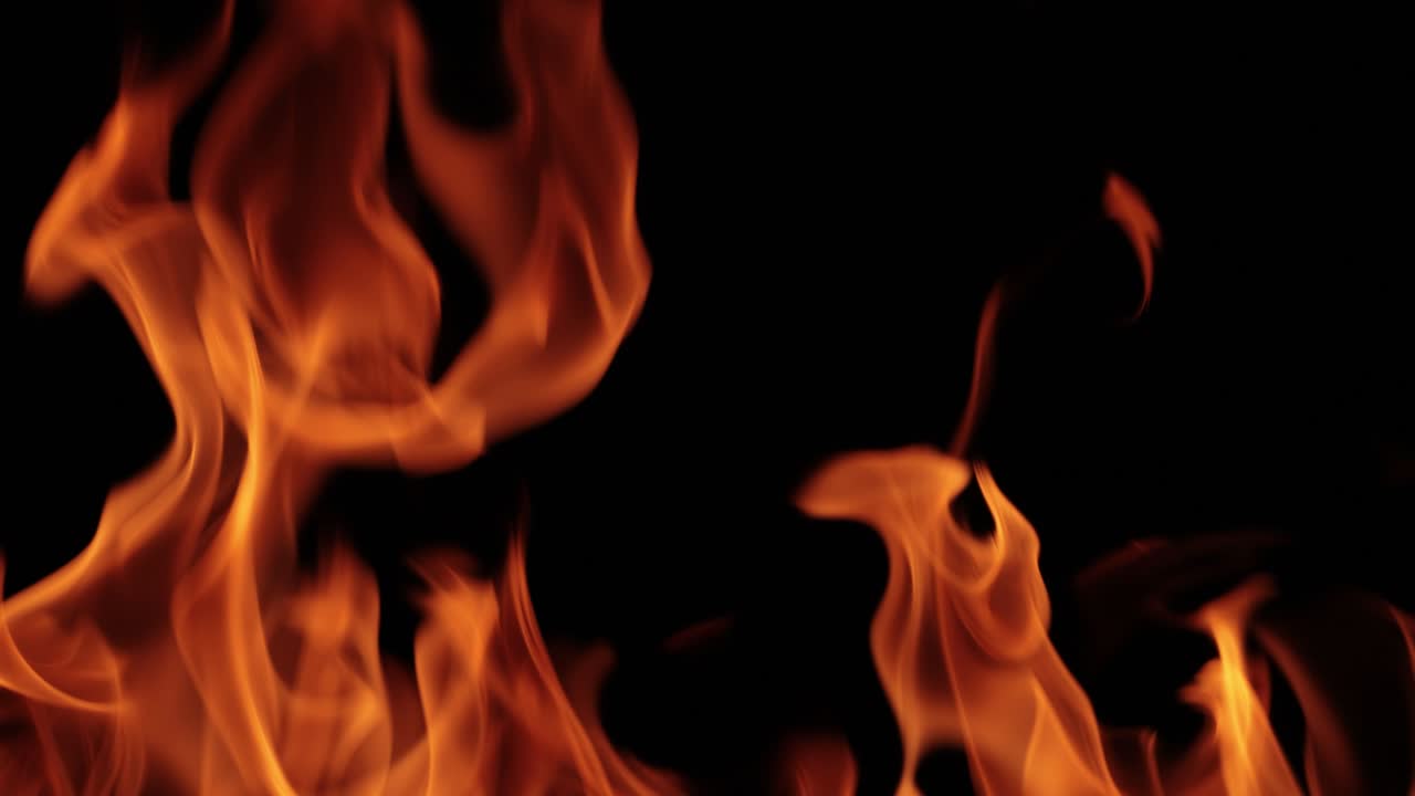 Flames of fire on black background in slow motion
