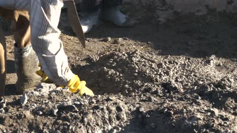 while-builder-working-they-pouring-water-to-mix-cement-old-fashion