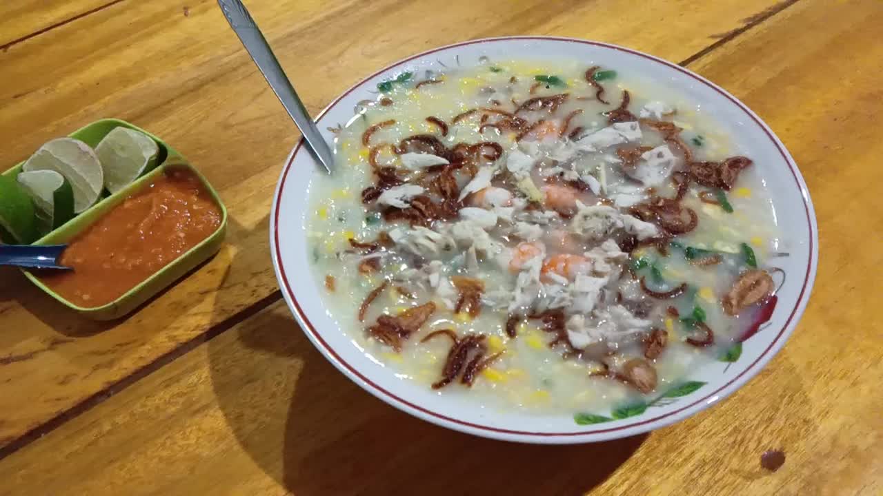 Barobbo or corn soup typical of Sulawesi Island served on a white plate