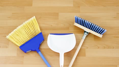 Two-brooms-and-dustpan