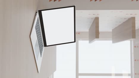 Vertical-video-animated-notebook-with-white-screen-in-office,-copyspace