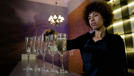 bartender serving champagne