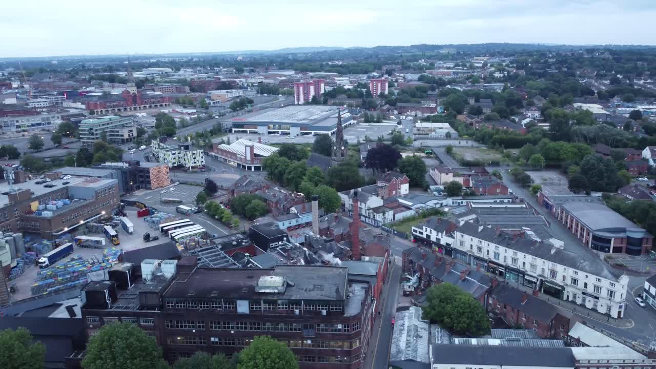 Drone shot of a UK city with a factory