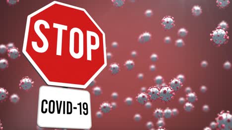Animation-of-falling-covid-19-cells-over-stop-sign