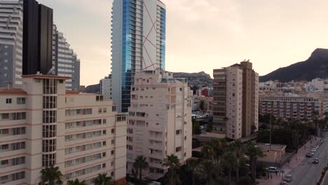 beautiful paning drone clip of luxurious hotels and apartment blocks in the city of calpe in spain
