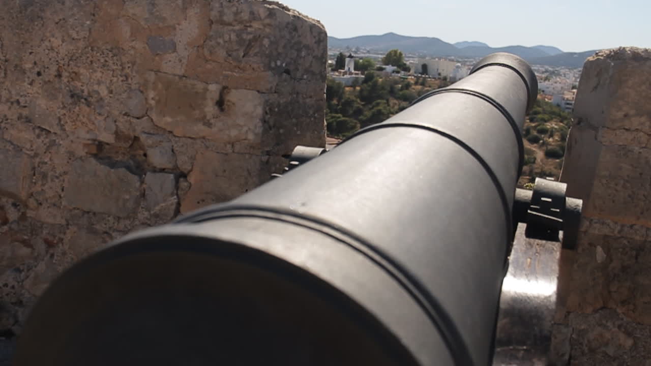 Cannon in a Fortification Overlooking a City