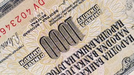 Close-up rotation of a 1000 dinara banknote from Yugoslavia
