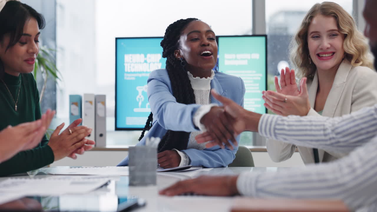 Business meeting with diverse team discussing neuro-chip technology