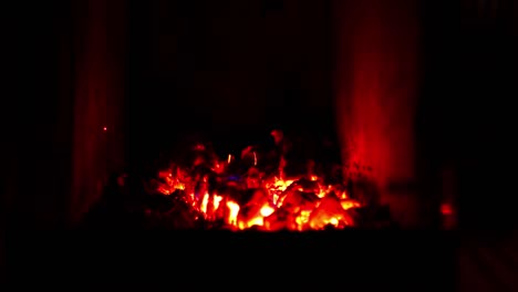 timelapse of charcoal burning inside fireplace.