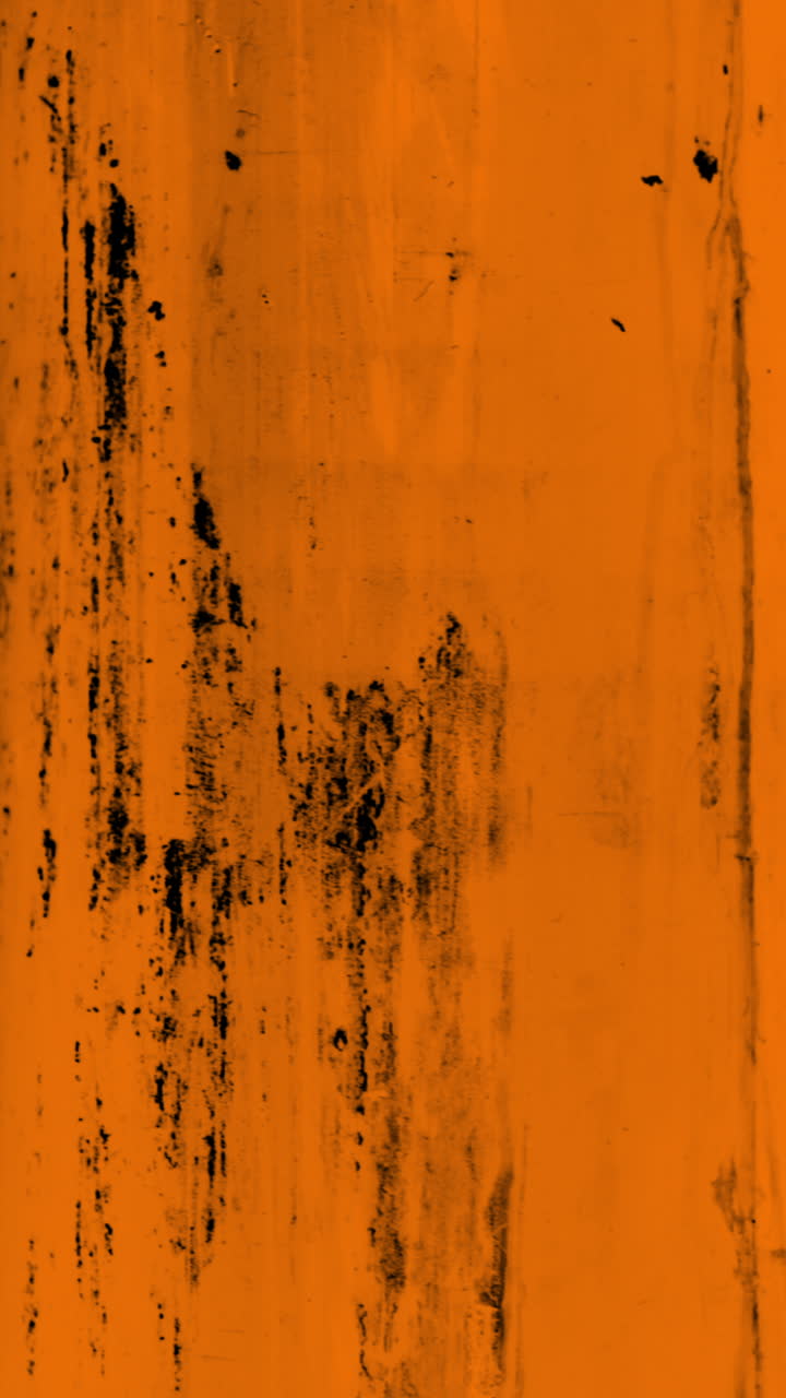 Animeret orange og sort grunge teksturbaggrund