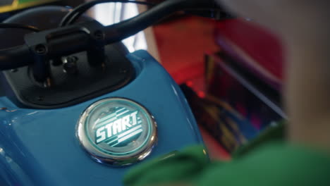 overhead view of girl starting arcade game