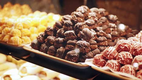 delicious chocolate and coconut pastries on display at a bakery