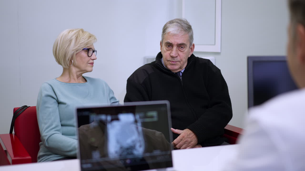 Medical consultation with senior couple