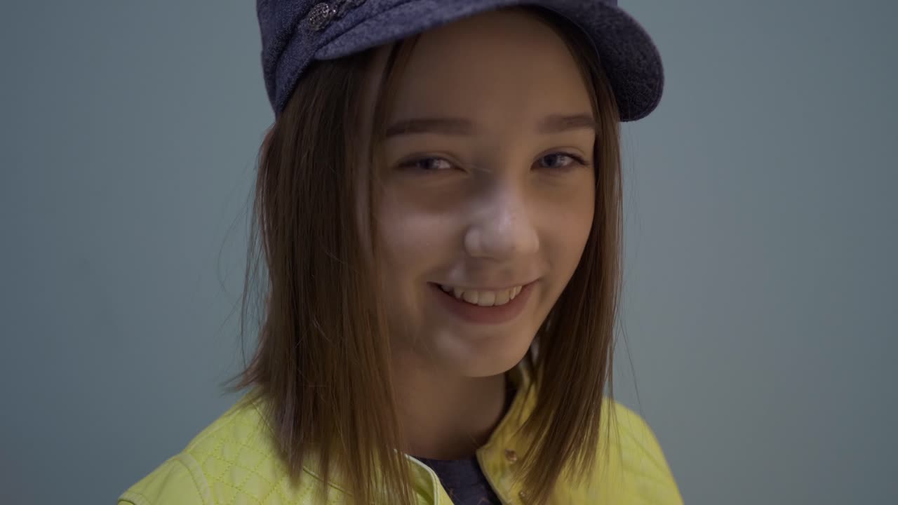 Teenage girl smiling at the camera