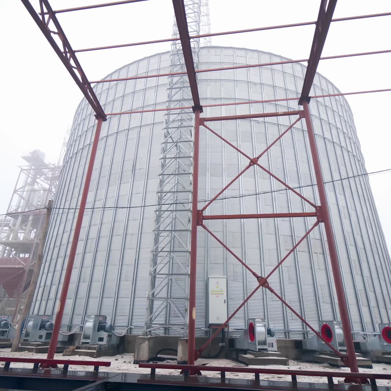 Large metal hangar for grain. Grain storage elevator, Large metal hangar for grain