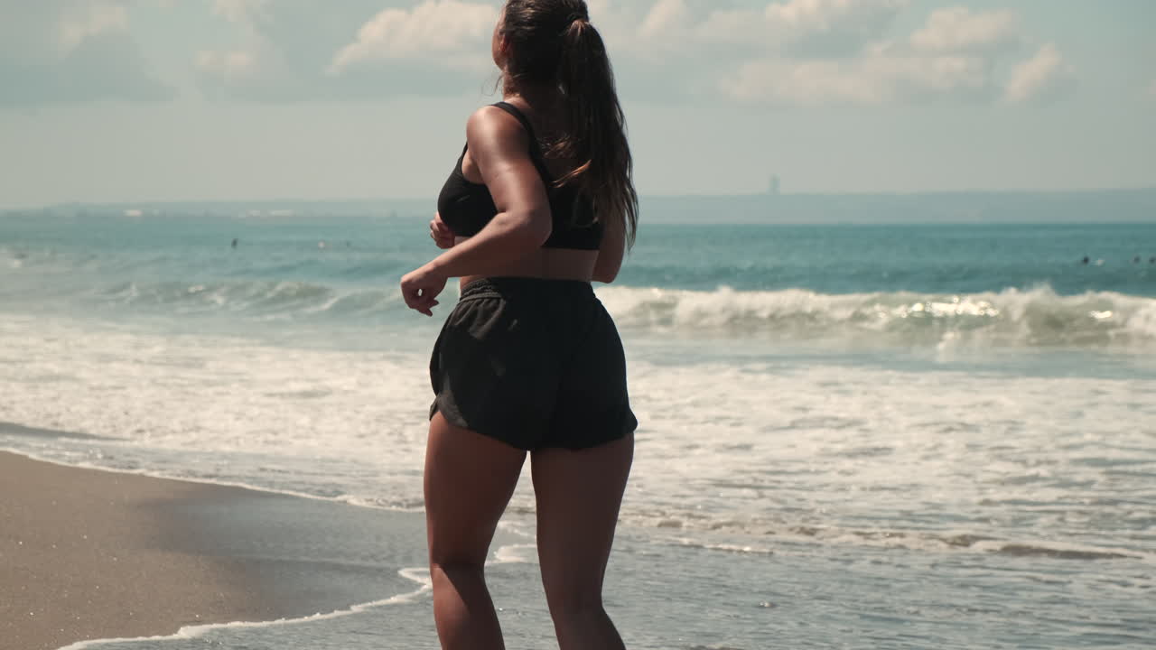Woman running on a beach