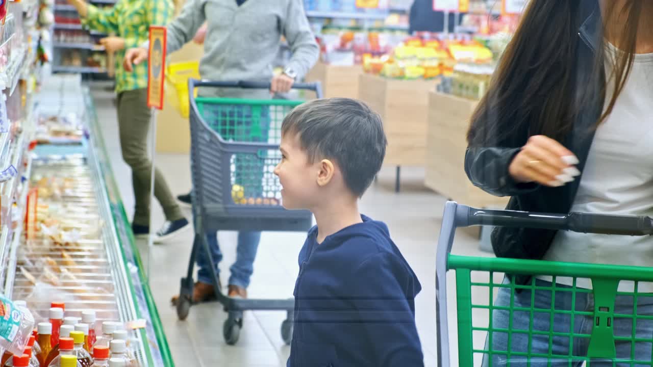 Family Shopping at Grocery Store