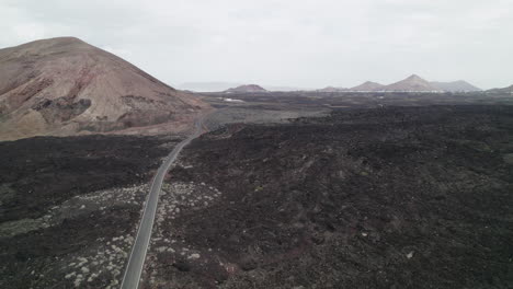 Aerial-Casacoral-Road,-Near-Pueblo-Tenesar-In-Lanzarote,-Canary-Islands