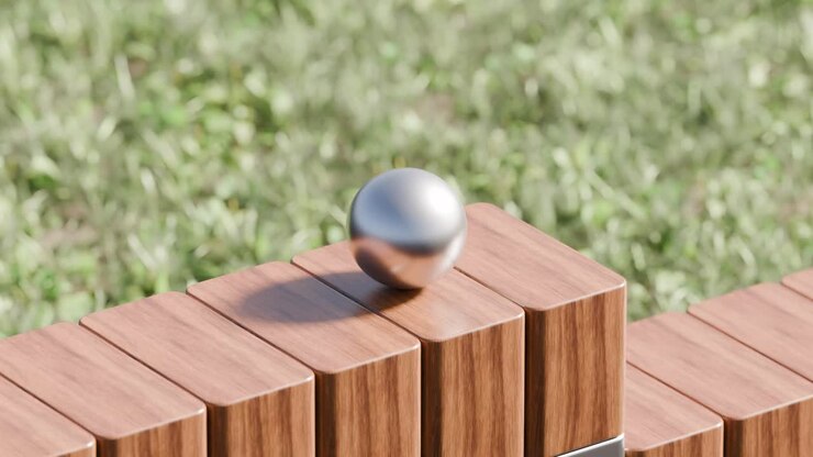 A sphere on a wooden bench