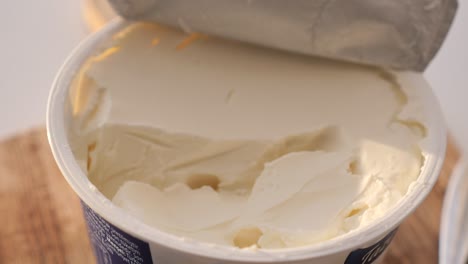 open container of cream cheese