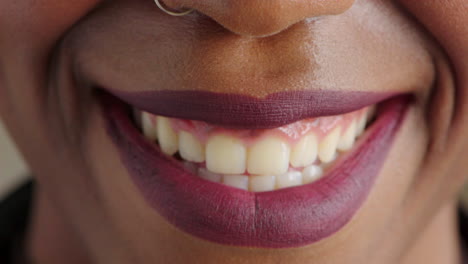 closeup of woman mouth, happy after dental