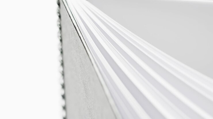 Micro of notebook pages and copy space on white background