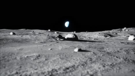 4k high detail closeup reveal dolly shot of moon lunar landscape with earth just above horizon