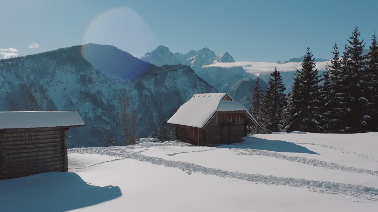 Snowy Alpine Cabin in Winter Landscape