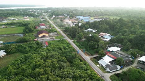 aerial drone view during summer kabong fishing village,with river and beach,sarawak,borneo