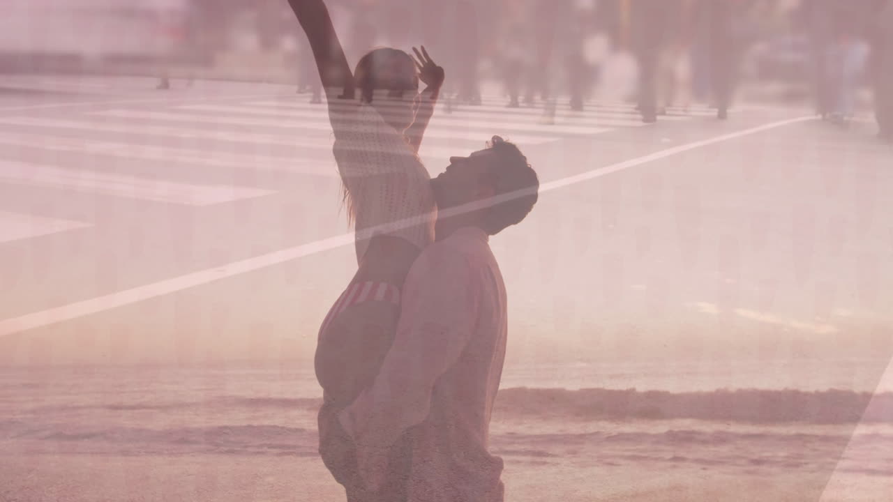 man lifting woman on beach at sunset, overlaying animated engagement charts for digital marketing