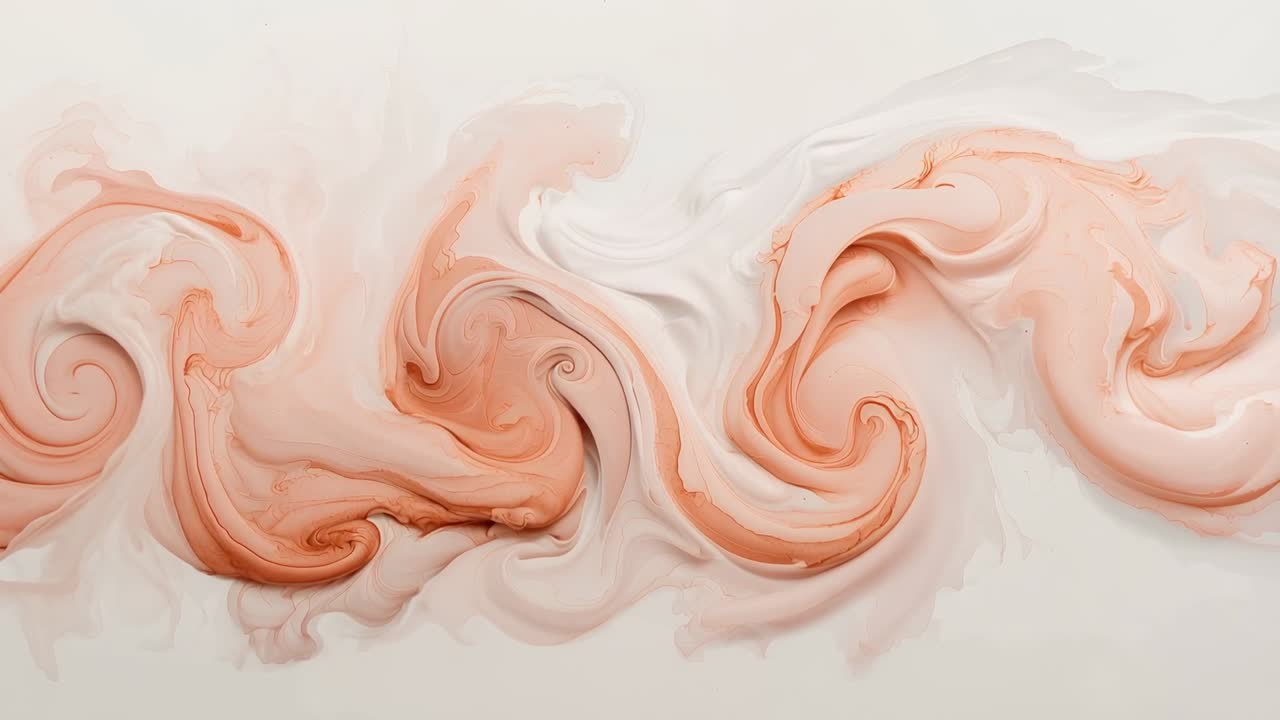 Stretching peach-orange pigment ribbon forming spiral eddies in basin, mixing with pale liquid