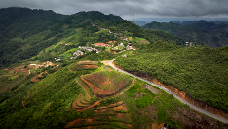 terraced rice fields and mountainous landscape of ha giang in vietnam - aerial drone shot