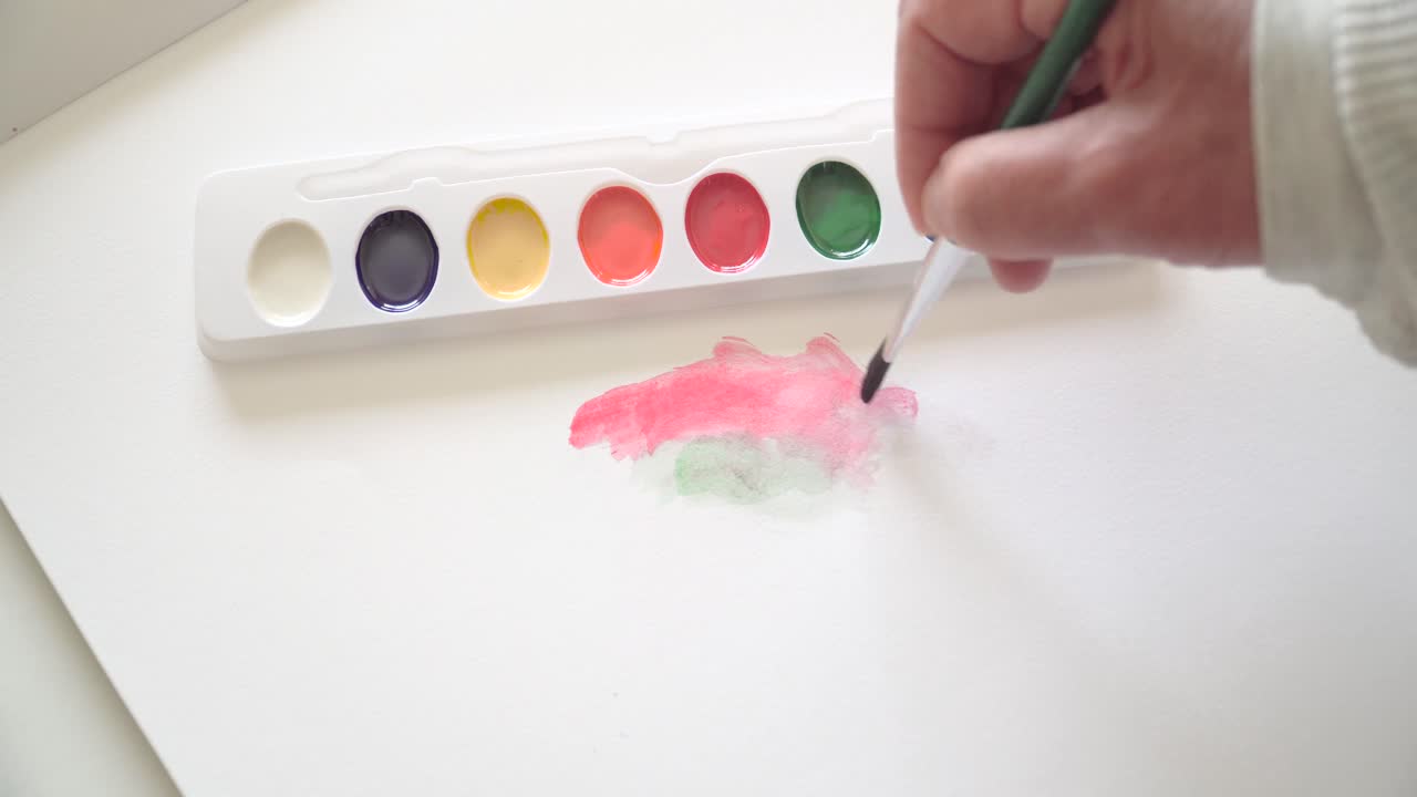 Painting using multi color palette used for creating art .