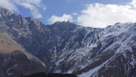 Mountains-with-snow-melting-and-carvasses-covered-in-snow-in-Kazbegi-Georgia-on-Russian-border-caucasus