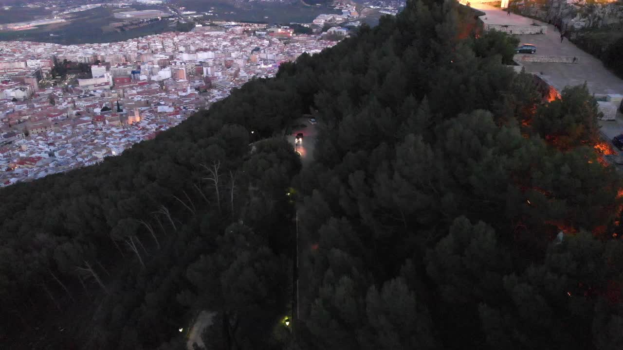 Jaen's Castle Saint Catalina Castle Spain shoot with a drone at 4k 24fps showing the exterior and the city from multiple points on a afternoon in December.