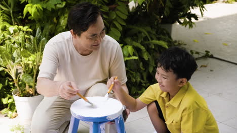 Asian-man-and-boy-in-the-backyard