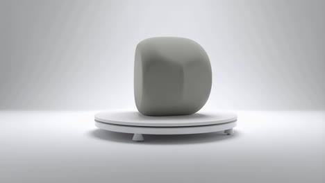 abstract gray shape on white platform